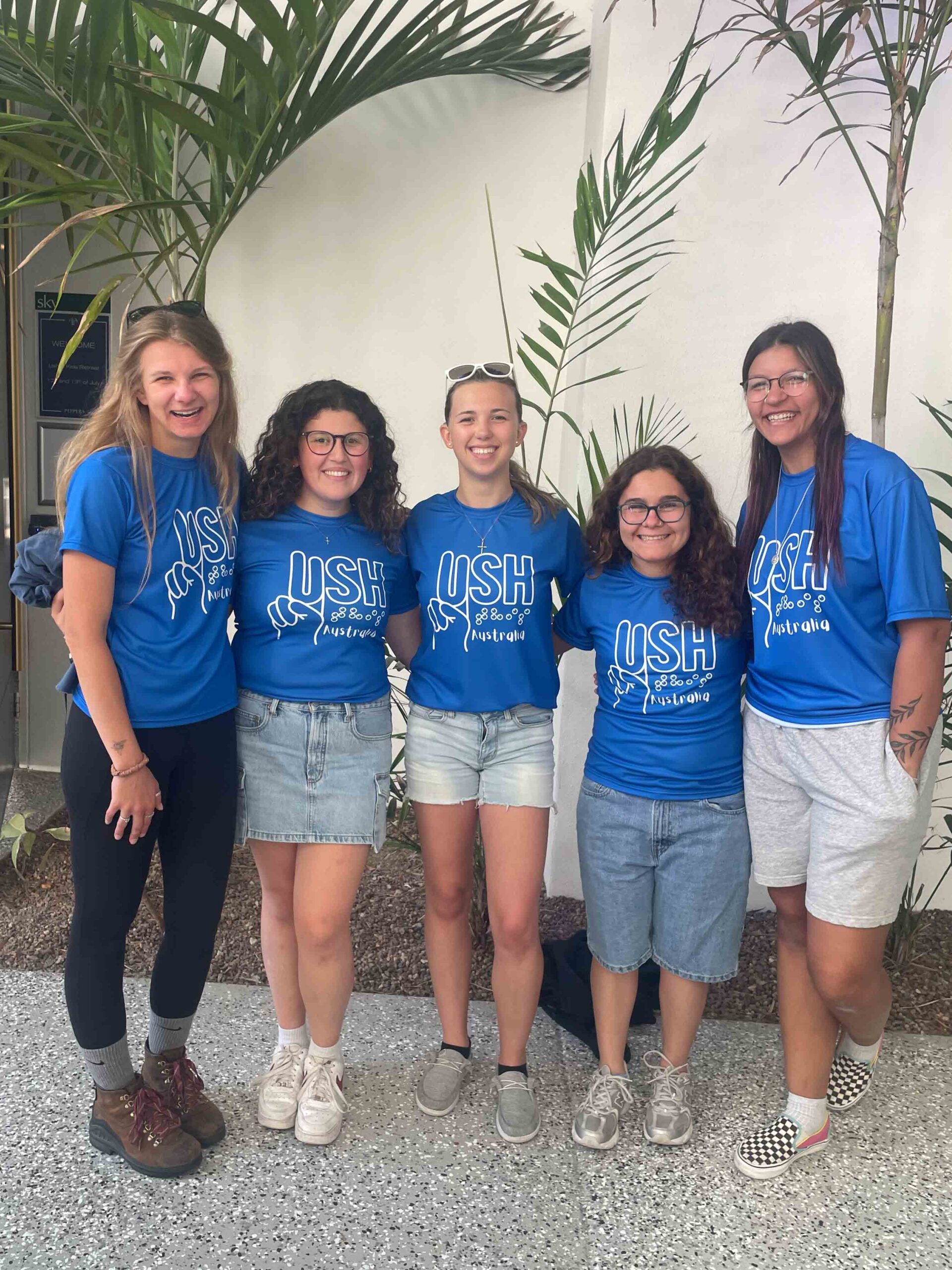  Olivia with 4 other USH mentors at USHthis camp in Australia.