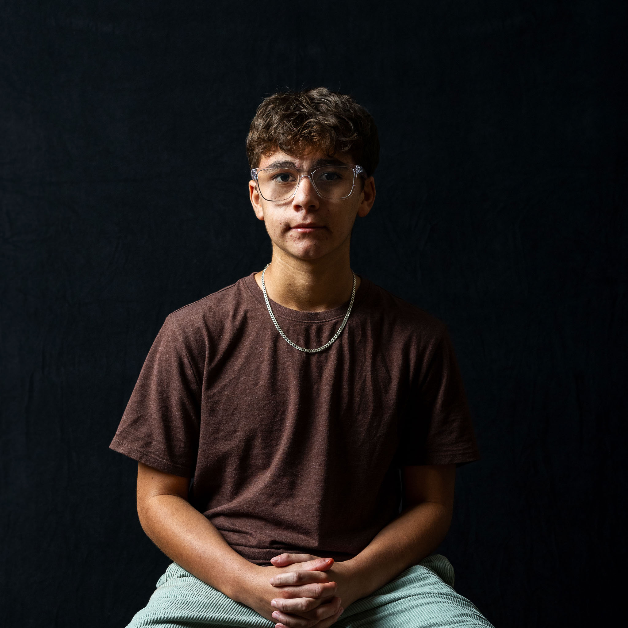 A portrait of Americo Castillo taken as part of the Usher Syndrome Society's Shine a Light on Usher syndrome portrait exhibit