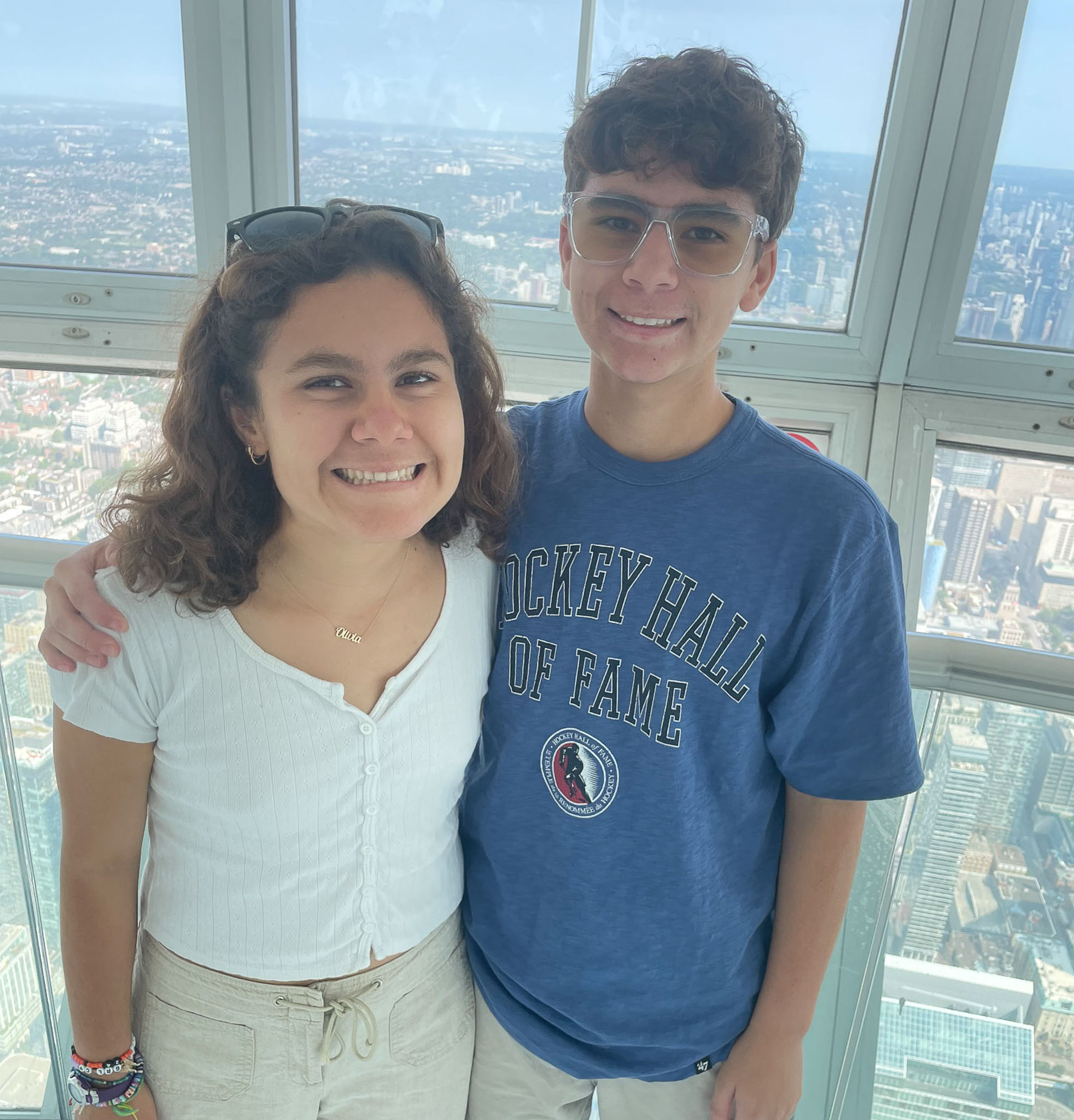 Amercio, with his sister Olivia, standing at the top of CN tower
