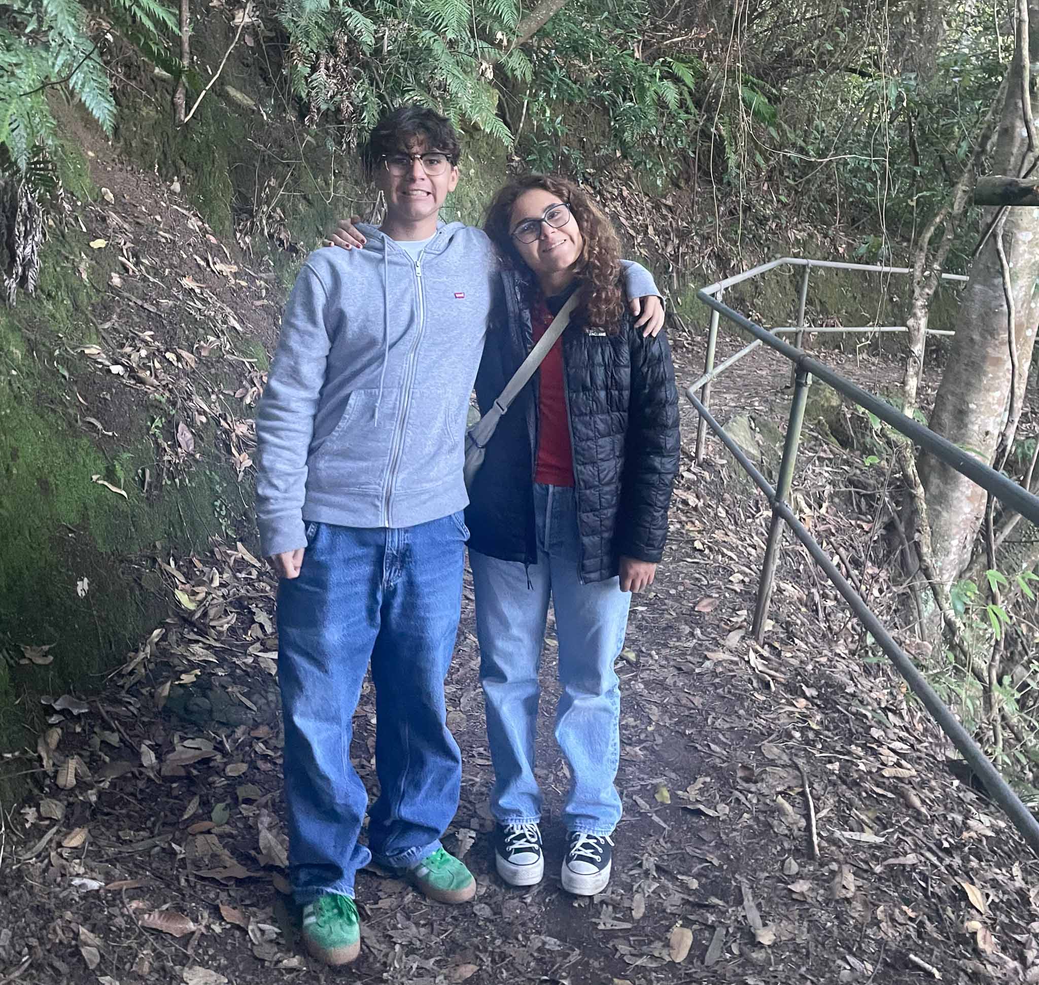 Amercio is with his sister, Olivia, with the Blue Mountains in Australia in the background