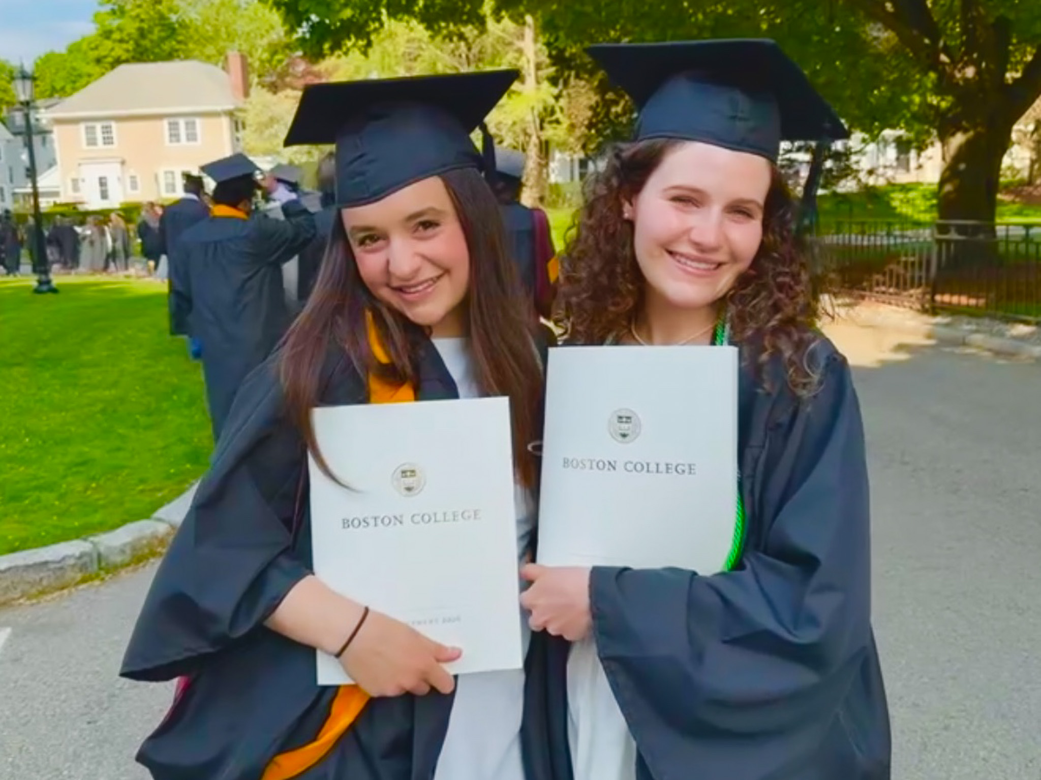 Katerina celebrating her recent graduation from Boston College with a friend.