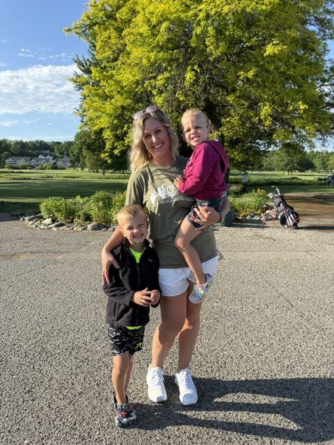 Nicole with her two kids at the 2026 Grand Rapids Open - Golf for a Cure