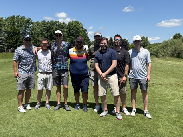 A group photo on the golf course at the 2026 Grand Rapids Open - Golf for a Cure
